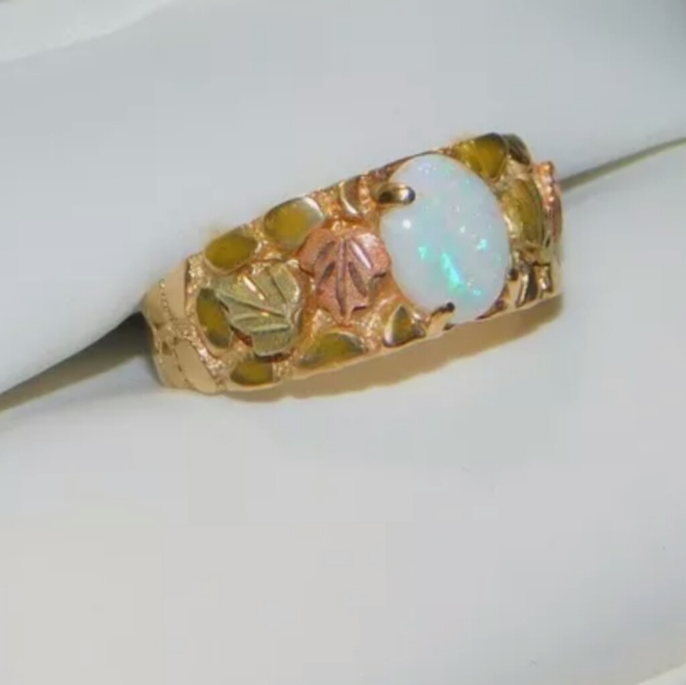 Black Hills gold with opal ring. Size 7